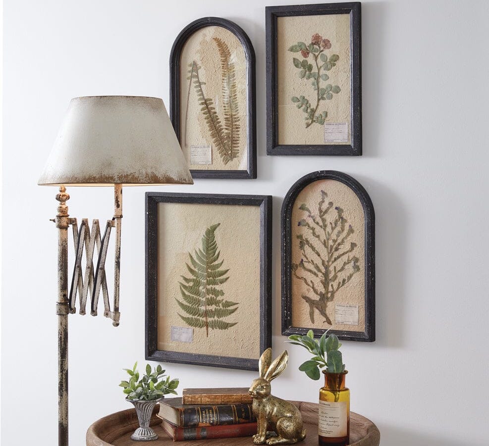 Framed botanical wall art grouping.